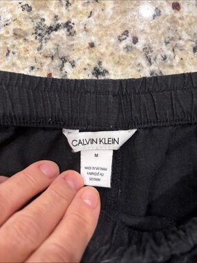 Calvin Klein Black Linen Jogger pants with Elastic Waistband and drawstring.